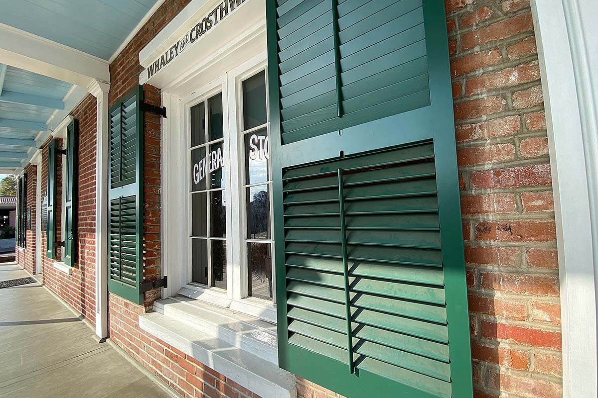 Close-up of the windows of the haunted Whaley House.